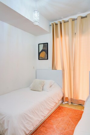 2 bedrooms, desk, iron/ironing board, travel cot