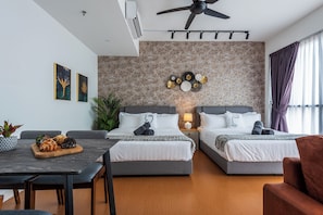 Apartamento superluxo | Área de estar | TV 50 polegadas com canais digitais, console de videogame