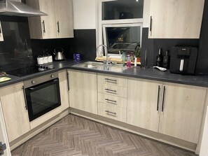 Appartement, plusieurs lits | Cuisine privée