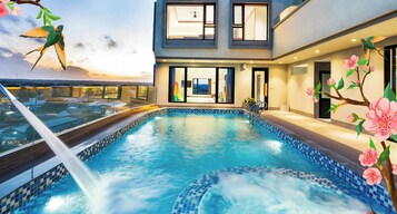 Outdoor pool, open 6:00 AM to 6:00 PM, pool umbrellas, sun loungers