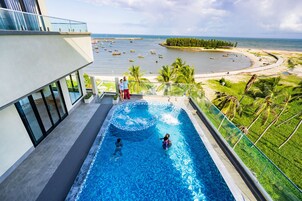 Outdoor pool, open 6:00 AM to 6:00 PM, pool umbrellas, sun loungers