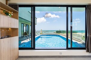 Outdoor pool, open 6:00 AM to 6:00 PM, pool umbrellas, sun loungers