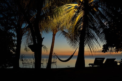 Waterfront room located in the Villa Harmonie on Ilot Fortier