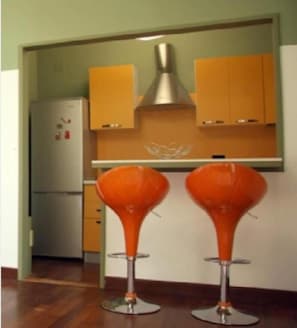 City-Apartment | Wohnbereich | Flachbildfernseher