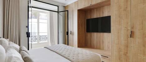 2 dormitorios, tabla de planchar con plancha, cuna de viaje y wifi