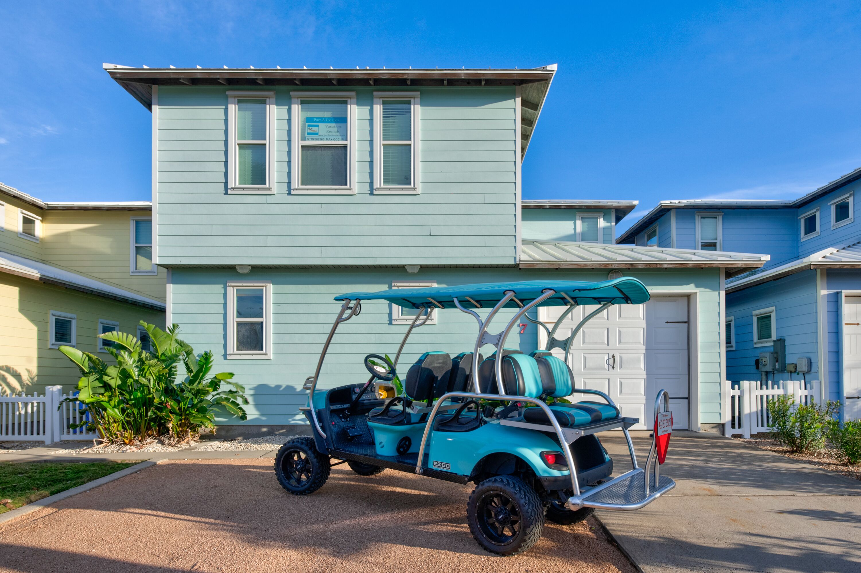 In-town Port A home | sleeps 12 | Community pool | Golf cart!