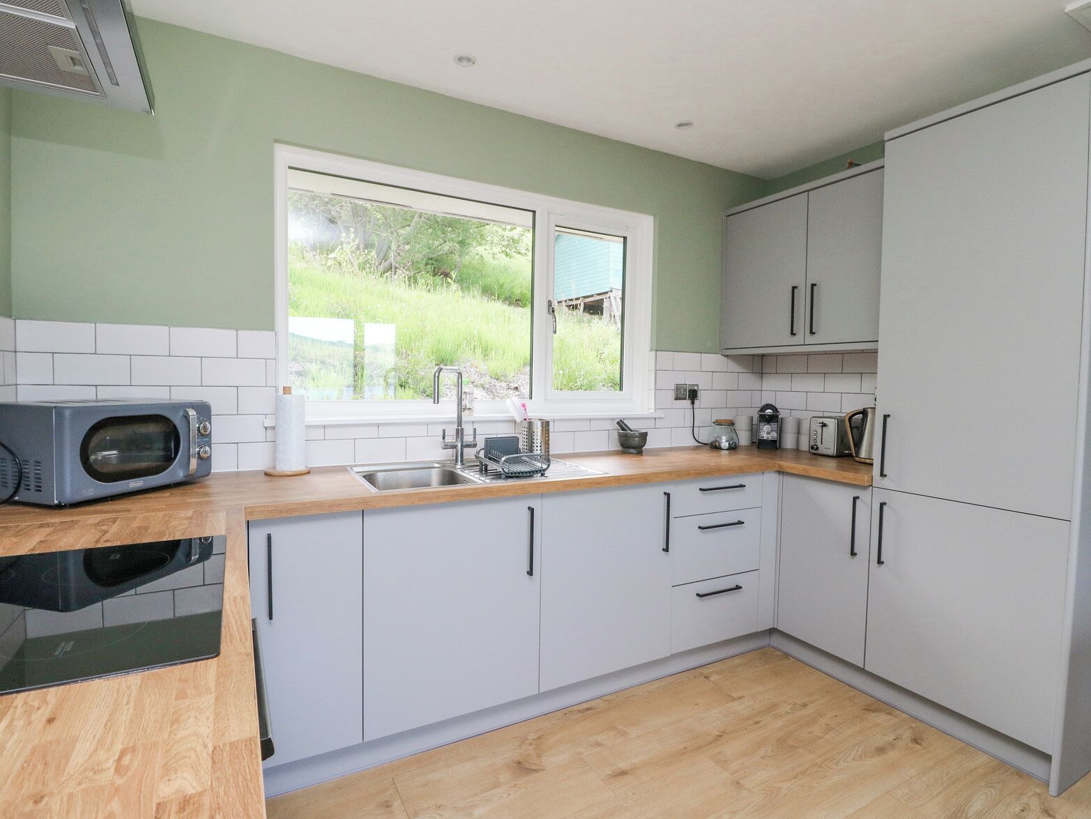 Fridge, electric kettle, toaster, cookware/dishes/utensils