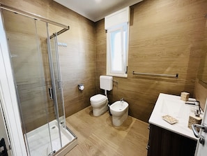 Hair dryer, towels, soap, toilet paper