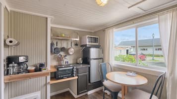 Fridge, microwave, coffee/tea maker, toaster