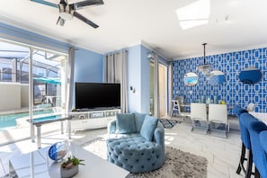 Villa, 4 Bedrooms | Living area - Family Retreat near Disney with Pool & Hot Tub! by RedAwning (Kissimmee)