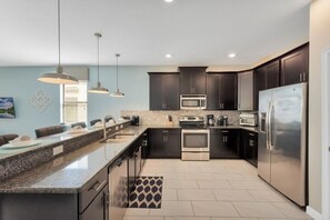 Private kitchen - Spacious & Bright W/all The Amenities-4911cg 8 Bedroom Home by RedAwning (Davenport)