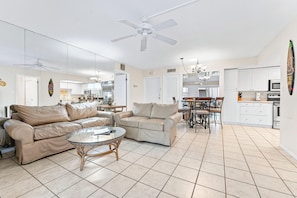 Condo, Multiple Beds, Partial Ocean View (305-S) | Living area | 32-inch TV with cable channels
