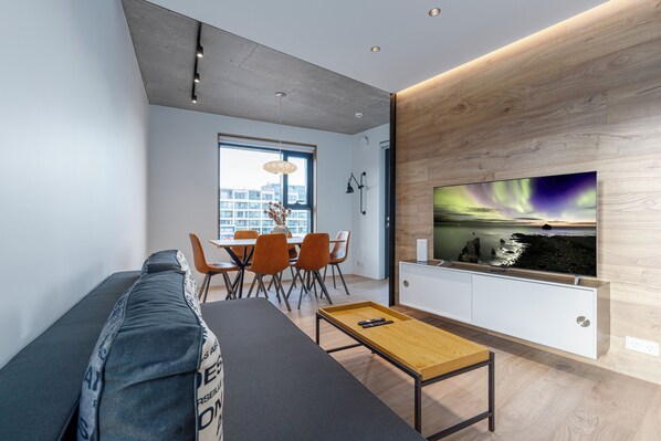 Luxury Apartment | Living area | Flat-screen TV