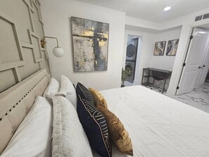 2 bedrooms, desk, iron/ironing board, travel crib