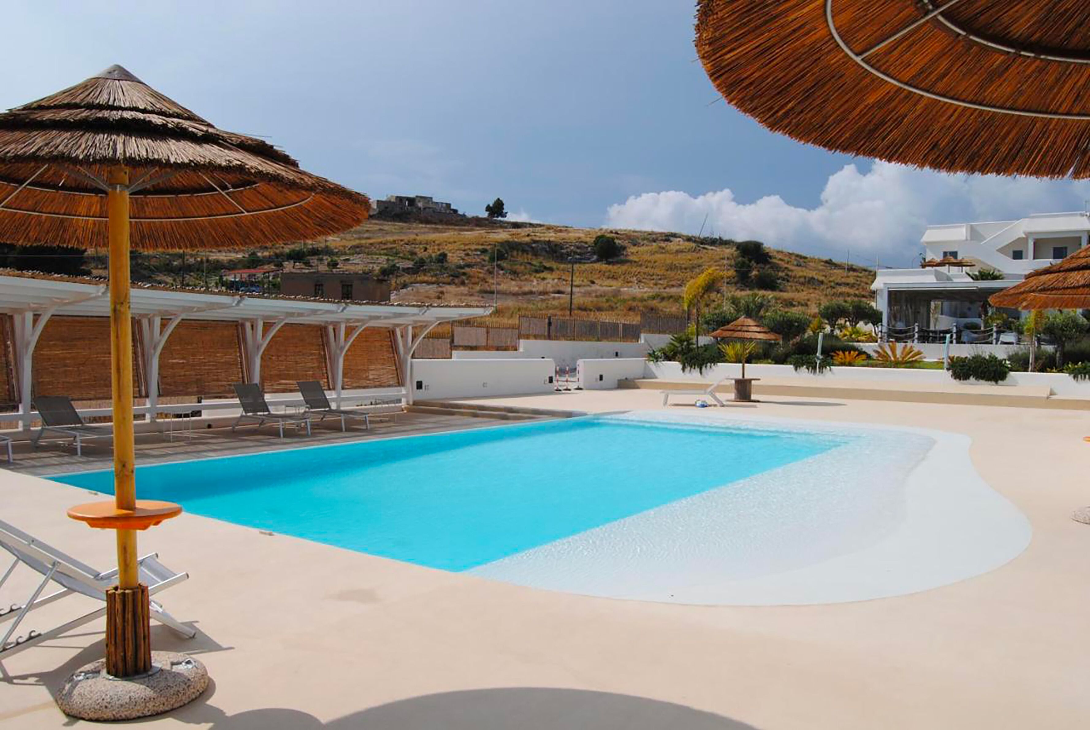 Outdoor pool, pool umbrellas, pool loungers