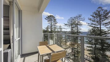 Apartment, 1 Bedroom, Ocean View | Premium bedding, down duvets, pillow-top beds, in-room safe