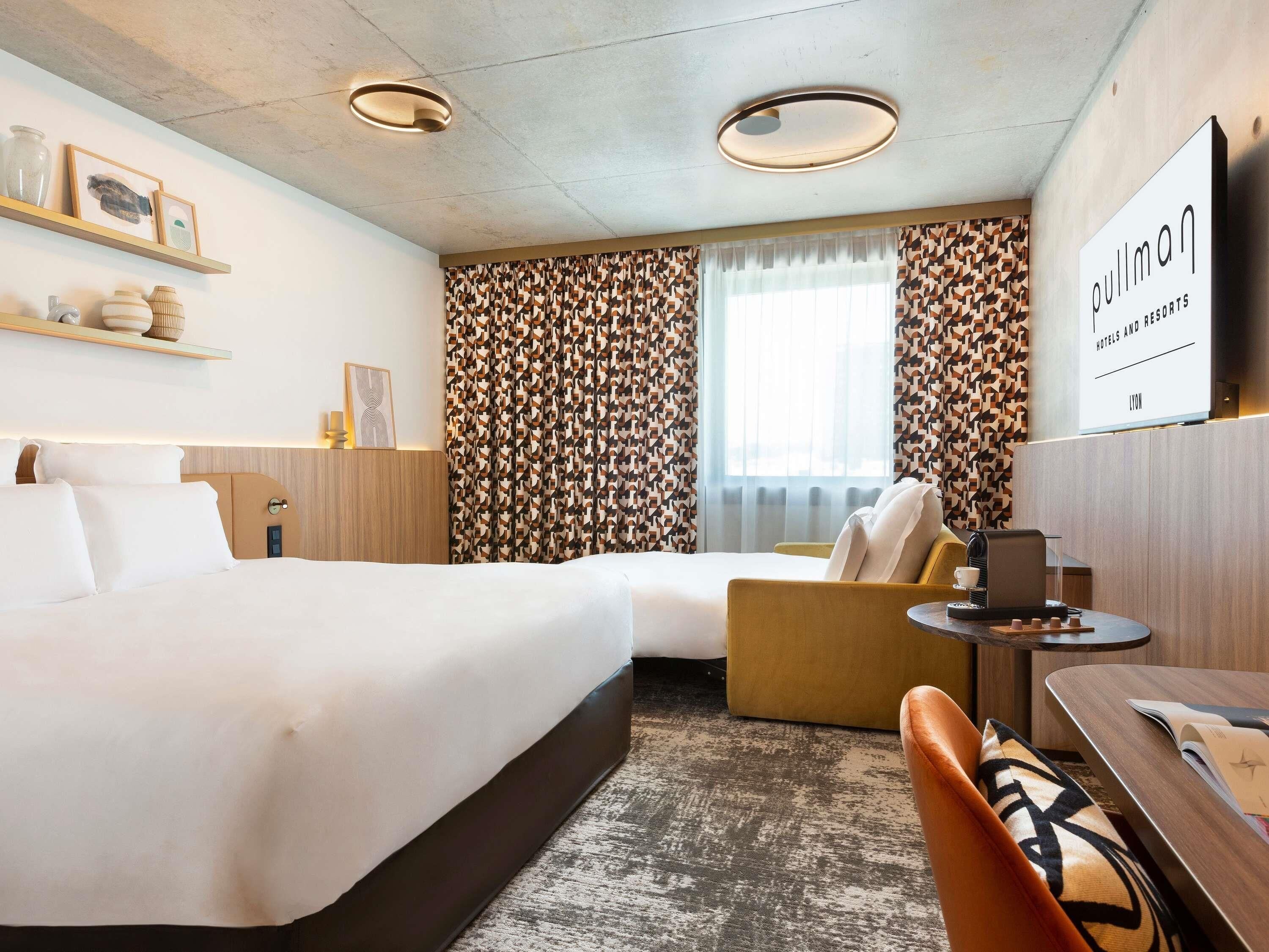 Premium bedding, pillow-top beds, in-room safe, desk