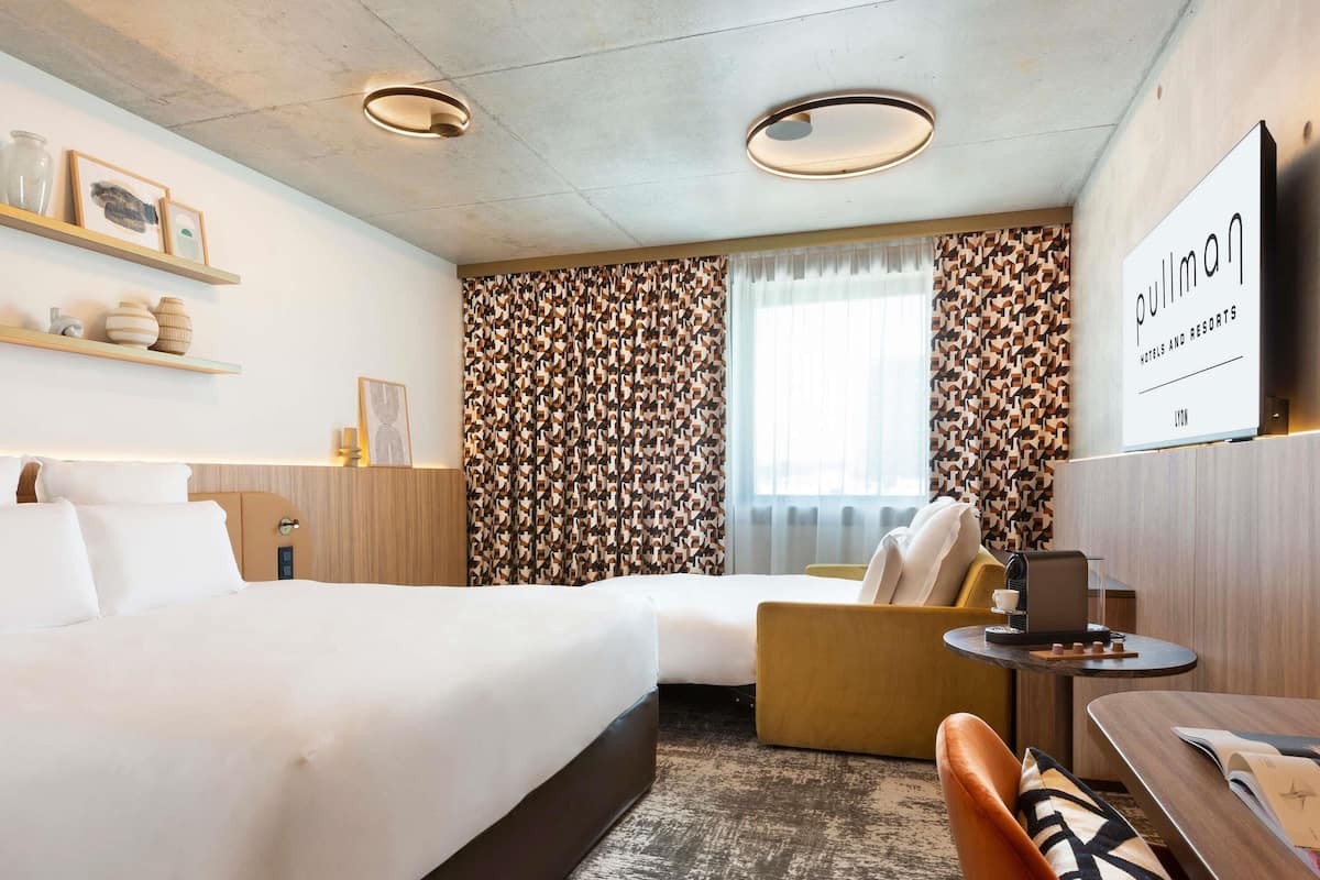 Premium bedding, pillow-top beds, in-room safe, desk