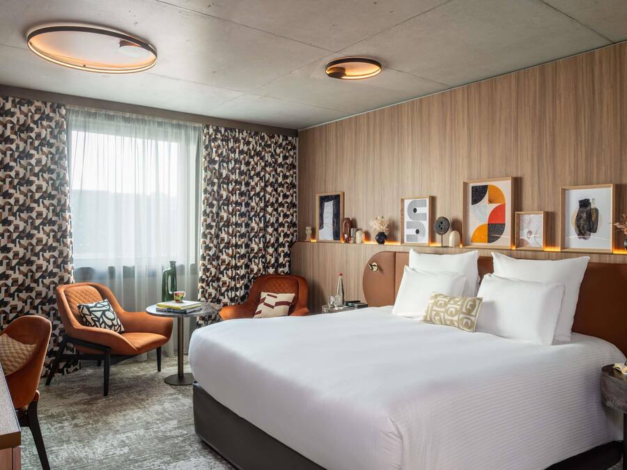 Luxe beddengoed, pillowtop-bedden, een kluis op de kamer, een bureau