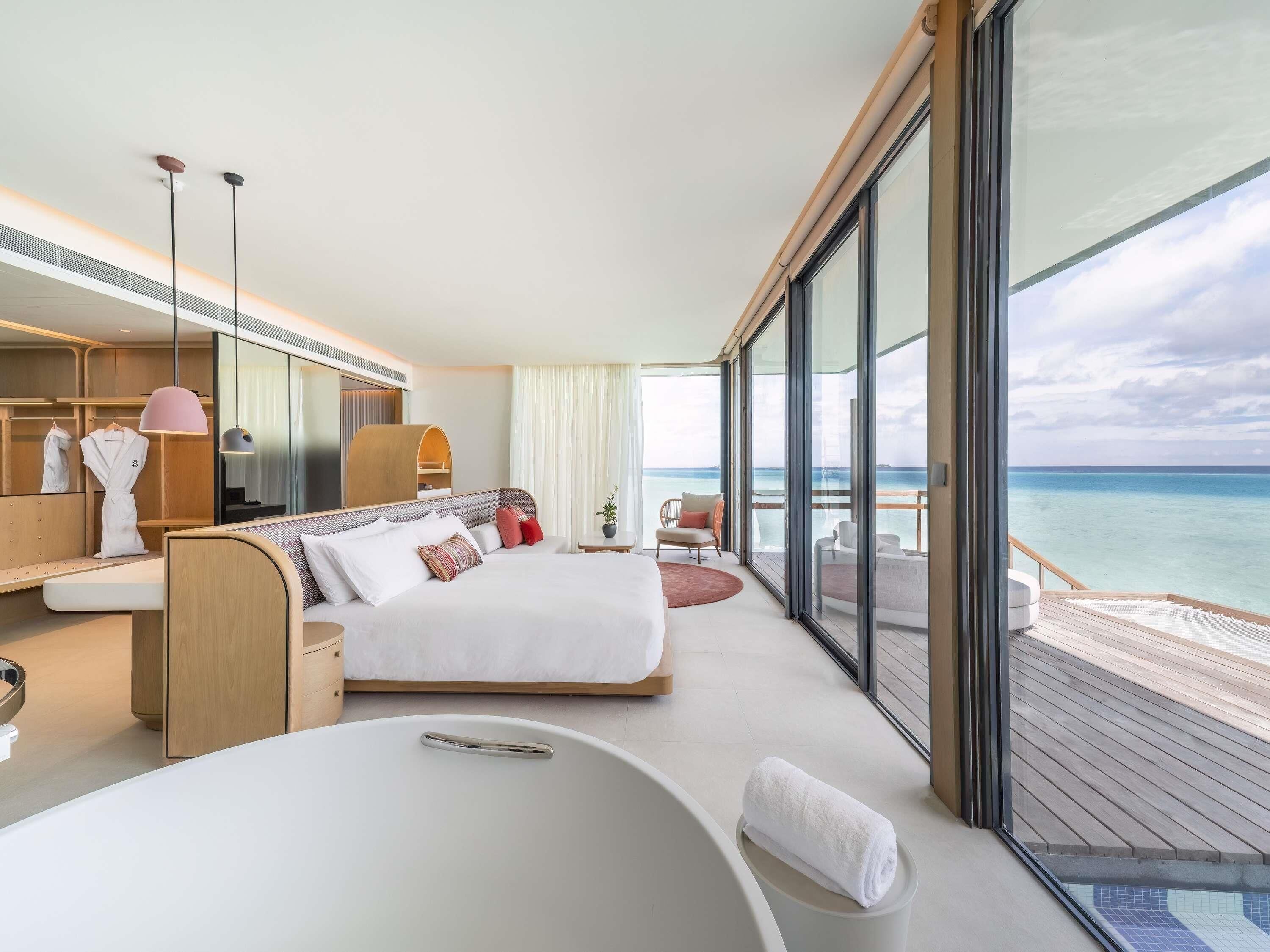 Premium bedding, memory-foam beds, minibar, in-room safe