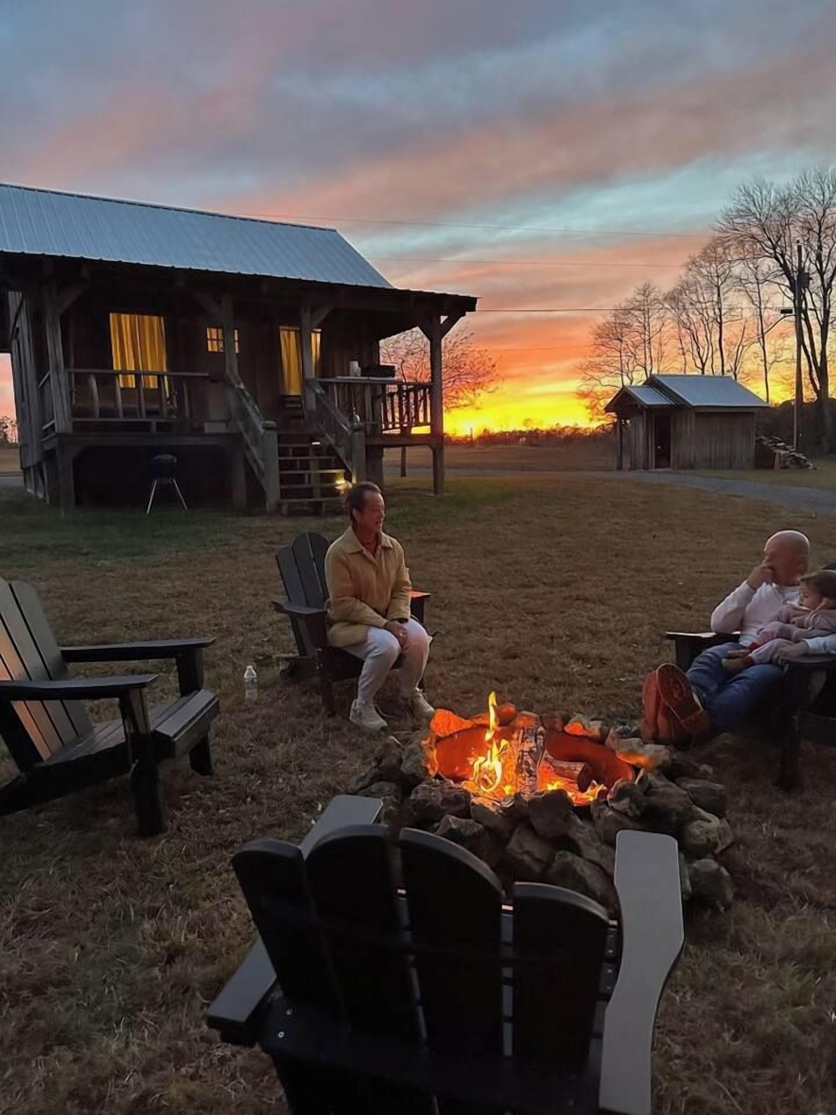 Gather round your private firepit with friends and family. Each cabin is equipped with 2 Adirondack chairs.