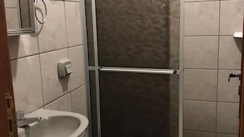 Shower, towels, soap, toilet paper