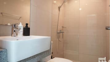 Shower, bidet, towels, soap