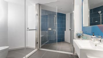 Standard Room, 1 King Bed (Extra Floor Space) | Bathroom | Shower, rainfall showerhead, free toiletries, hair dryer