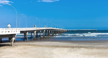 Super cozy beach house with pool for you and your family.