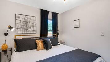 2 bedrooms, desk, iron/ironing board, travel crib