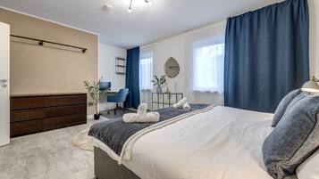 2 slaapkamers, een strijkplank/strijkijzer, gratis wifi, beddengoed