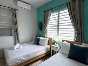 2 bedrooms, iron/ironing board, travel crib