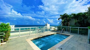 Outdoor pool, a heated pool - ★★★★★ Luxury Condo Just Steps Away from the Beach (Hollywood)
