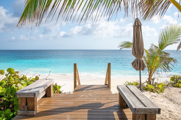 On the beach, sun-loungers, beach towels