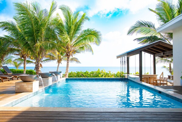 Outdoor pool, a heated pool - The Breakwater- HEATED POOL with Swim Up Bar on Sandy, Secluded Beach! (Farmer's Hill)