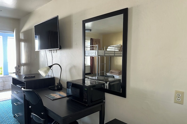 Family room with 1 Queen Bed and 1 Bunk Bed | 1 bedroom, blackout drapes, iron/ironing board, free WiFi