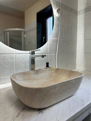 Hair dryer, towels, soap, toilet paper