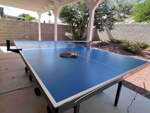 Enjoy a game of ping pong in our covered outdoor space.