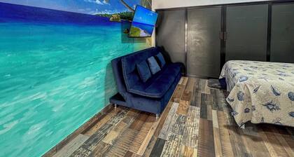 One bedroom. Outdoor Pool, outdoor grill, mezzanine floor. Kids welcome