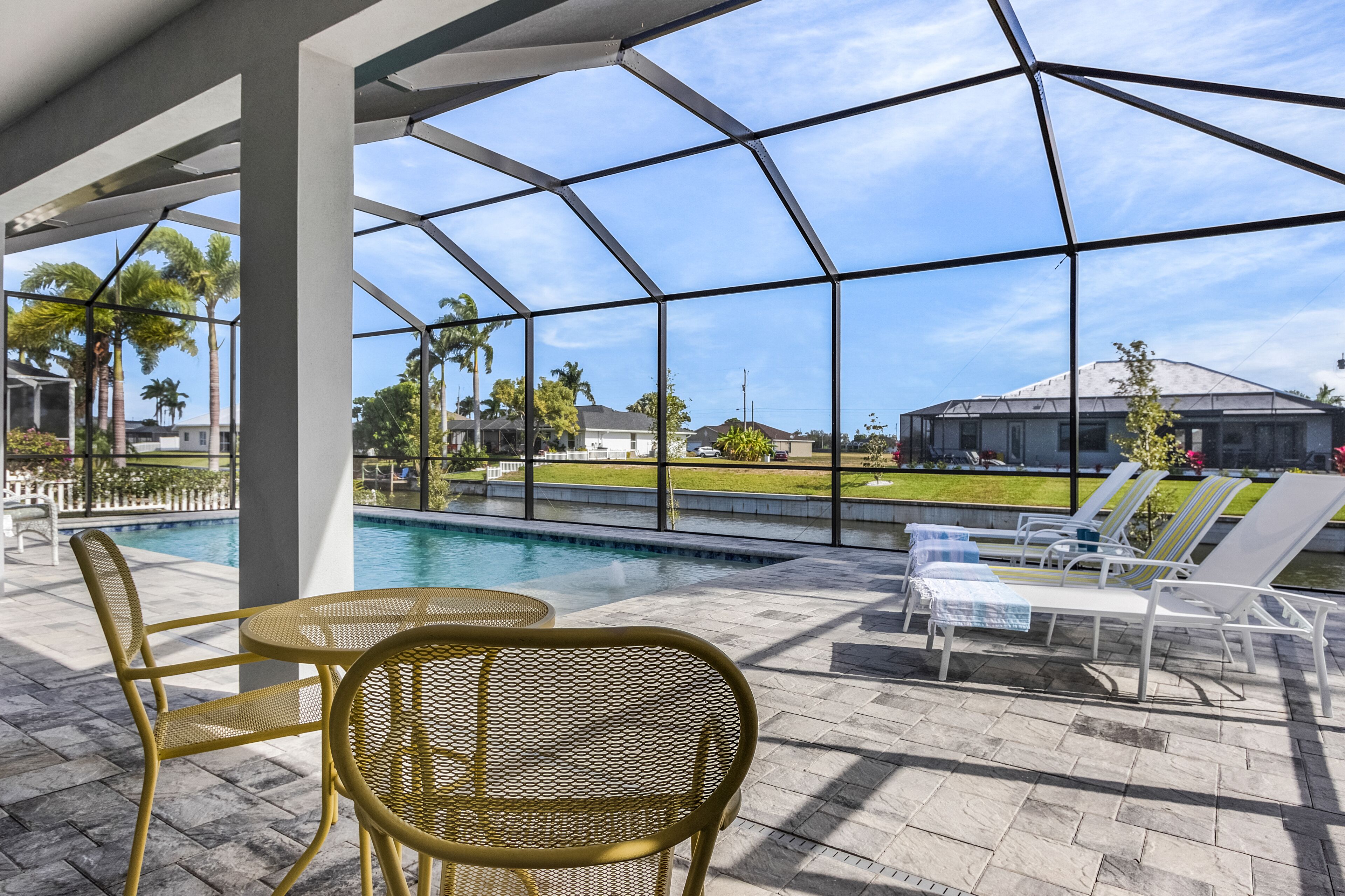 Pool overlooking canal, Outdoor Grilling station - Villa Sand Dollar Siesta