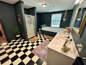 Jetted tub, hair dryer, towels, soap