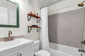 Hair dryer, towels, soap, shampoo