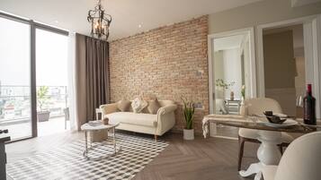 Premier Suite, 1 Bedroom, Terrace, City View | Living area | 55-inch LED TV with cable channels, Netflix, Hulu