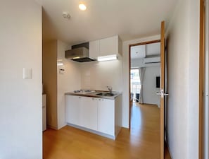 Basic Double Room | Private kitchen | Full-size fridge, microwave, stovetop, electric kettle