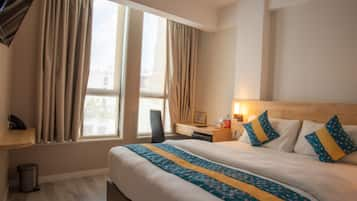 Deluxe Room | Desk, blackout curtains, iron/ironing board, free WiFi