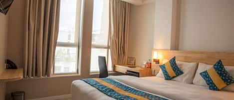 Deluxe Room | Desk, blackout drapes, iron/ironing board, free WiFi