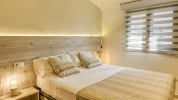 2 dormitorios, tabla de planchar con plancha, wifi gratis y ropa de cama