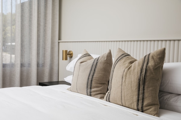 Premium bedding, pillow-top beds, free WiFi, bed sheets