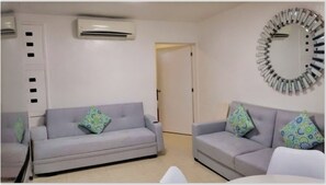 Departamento, 1 habitación, para fumadores, patio | Área de sala de estar