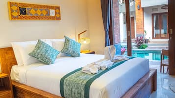 Deluxe Double Room, Ground Floor | Minibar, in-room safe, desk, soundproofing